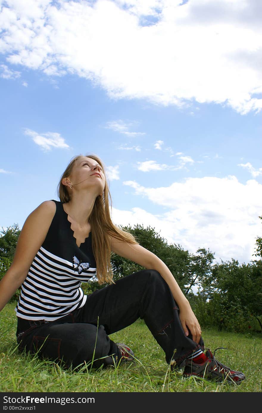 Girl admires beauty of the nature. Girl admires beauty of the nature