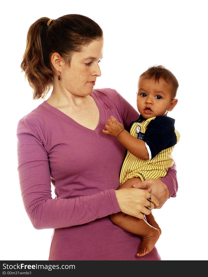 Thirty-something mother admiring her 6-month old biracial son. Thirty-something mother admiring her 6-month old biracial son.