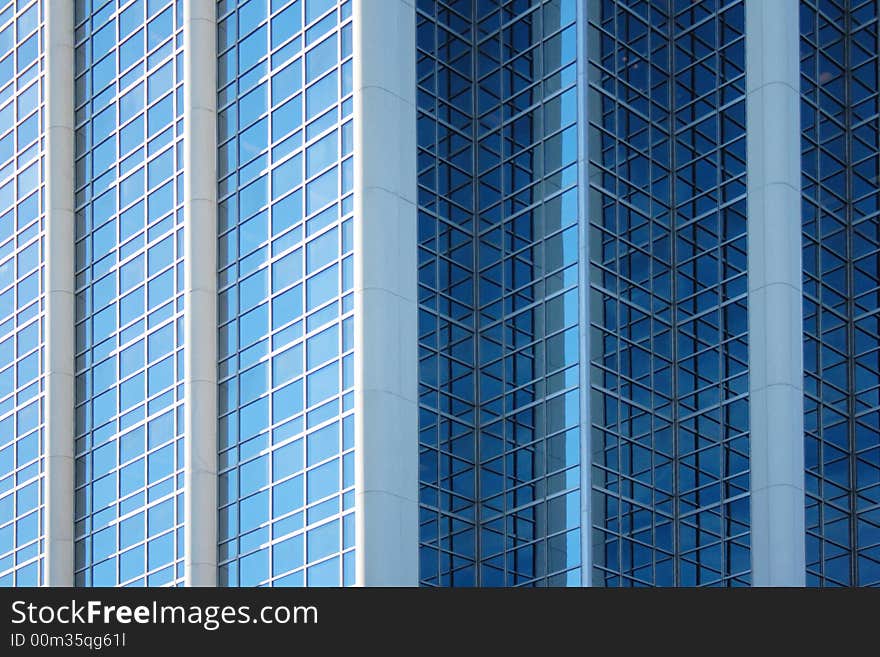 Clouds reflecting in the windows of a corporate building. Clouds reflecting in the windows of a corporate building