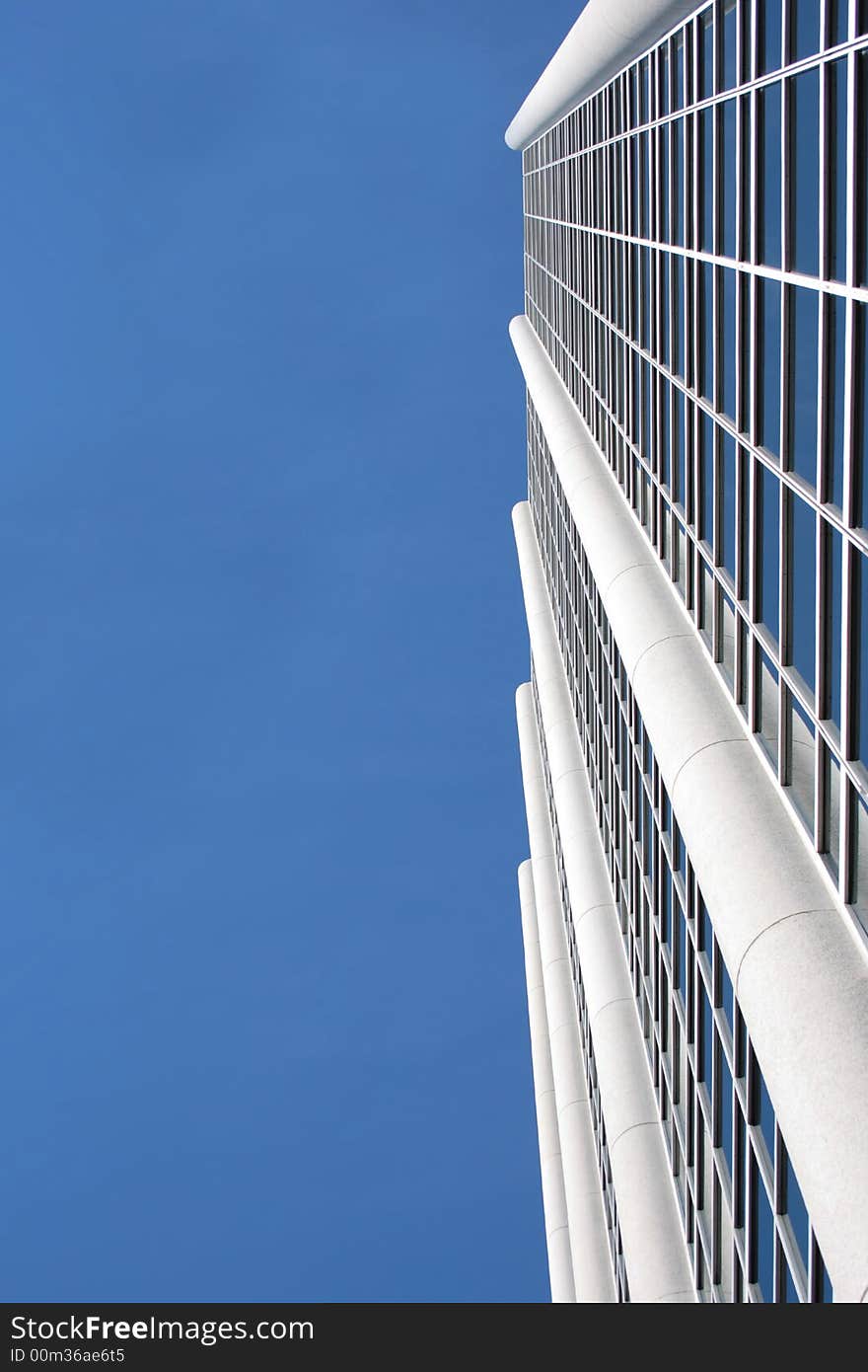 Clouds reflecting in the windows of a corporate building. Clouds reflecting in the windows of a corporate building