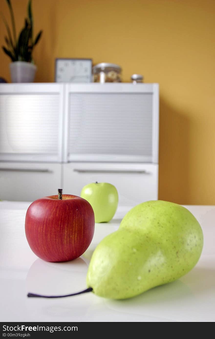 Fruits in modern white kitchen