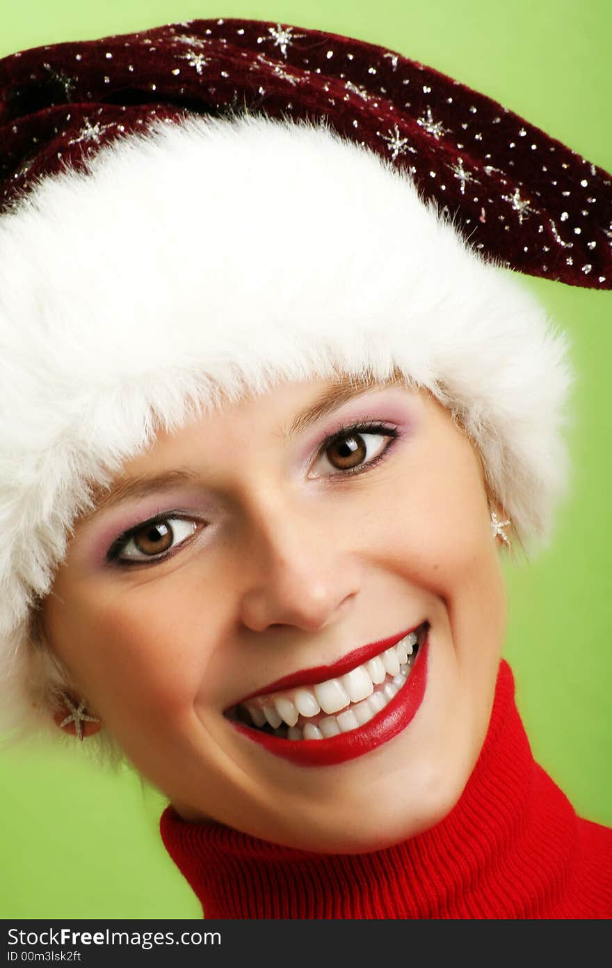 Winter portrait of a beautiful young woman with a cap. Winter portrait of a beautiful young woman with a cap