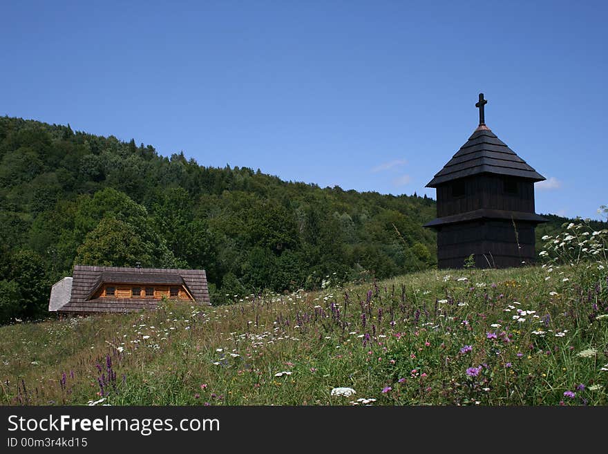 Small wooden chapel at the end of the village. Small wooden chapel at the end of the village