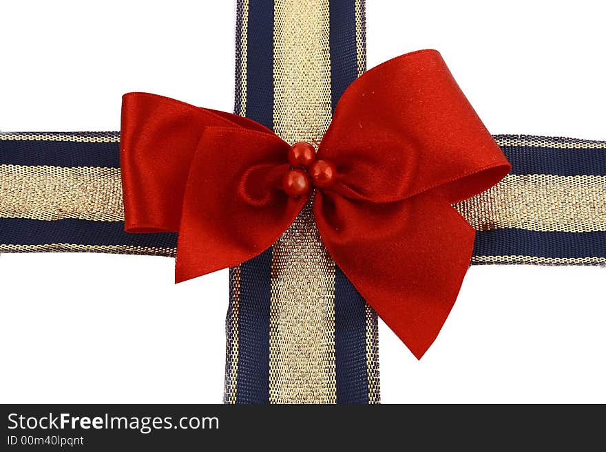 Gift golden ribbon and bow isolated on white.