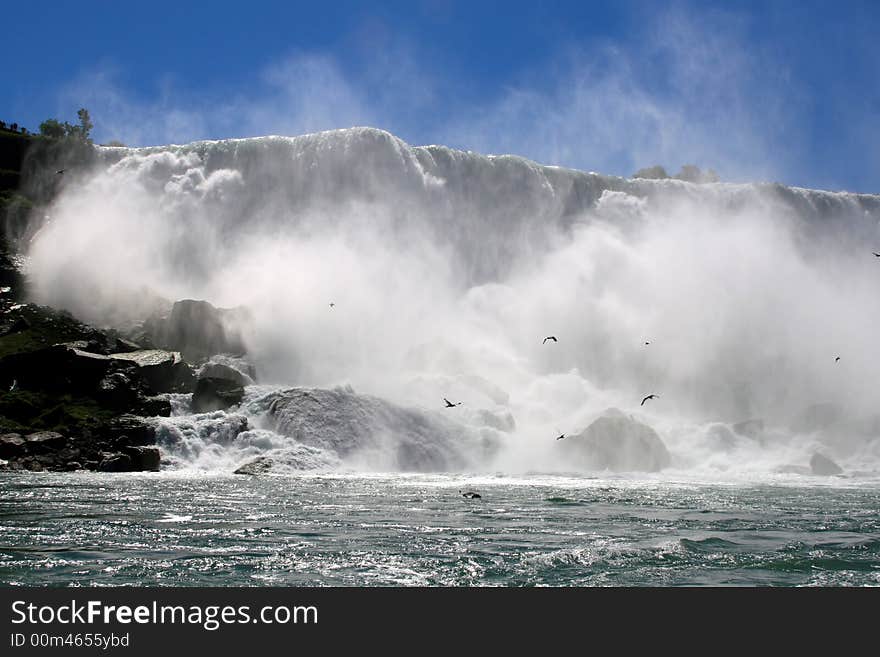 This rocky river view captures the powerful drama of Niagara's thunderous American Falls. This rocky river view captures the powerful drama of Niagara's thunderous American Falls.