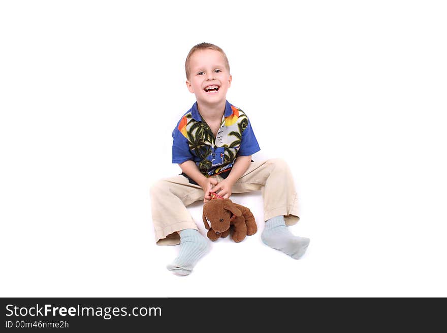 Boy and his toy on the white background. Boy and his toy on the white background