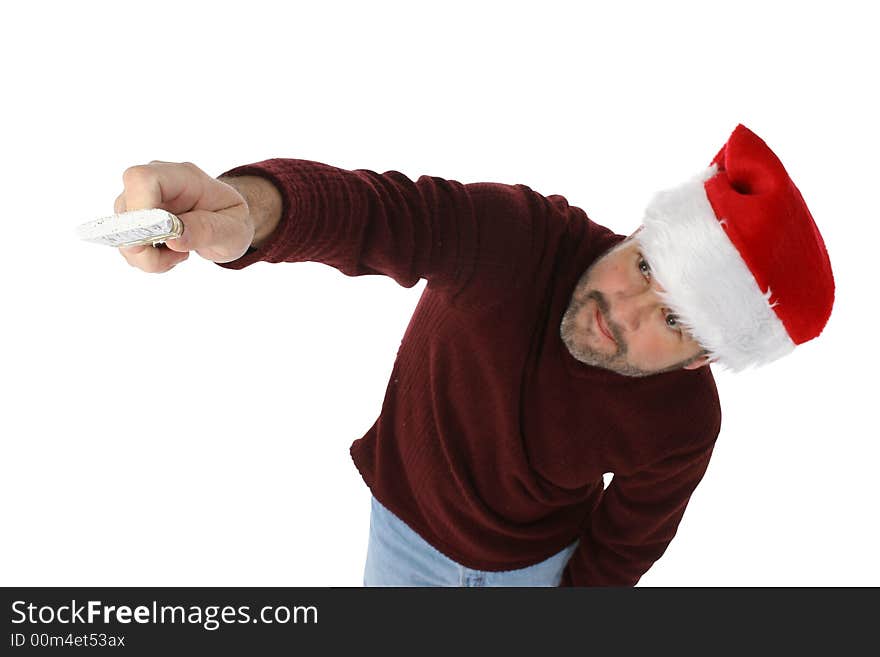 Fourty something man in holiday hat painting with white paint brush. Focus on brush and hand. Fourty something man in holiday hat painting with white paint brush. Focus on brush and hand.