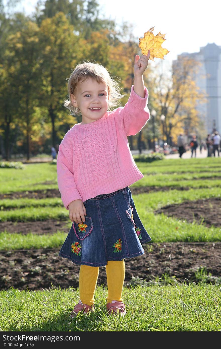 Girl With Yellow Leaf