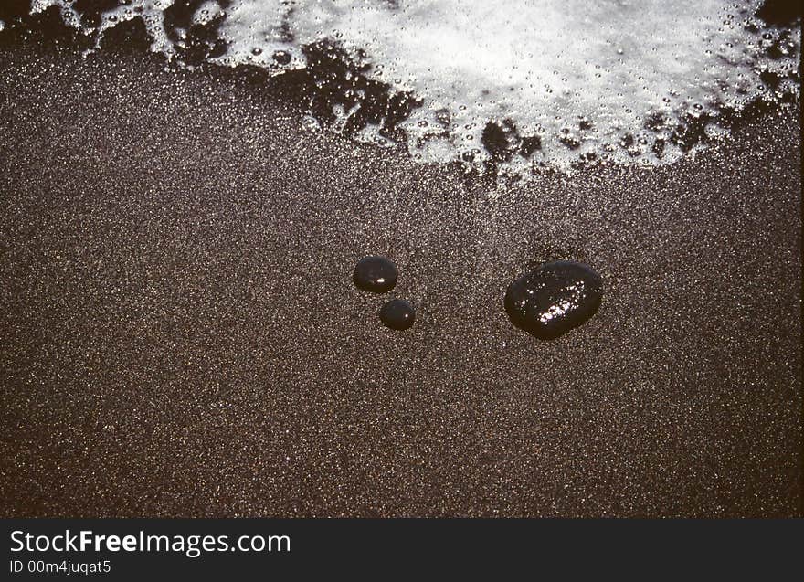 Black sandy shore