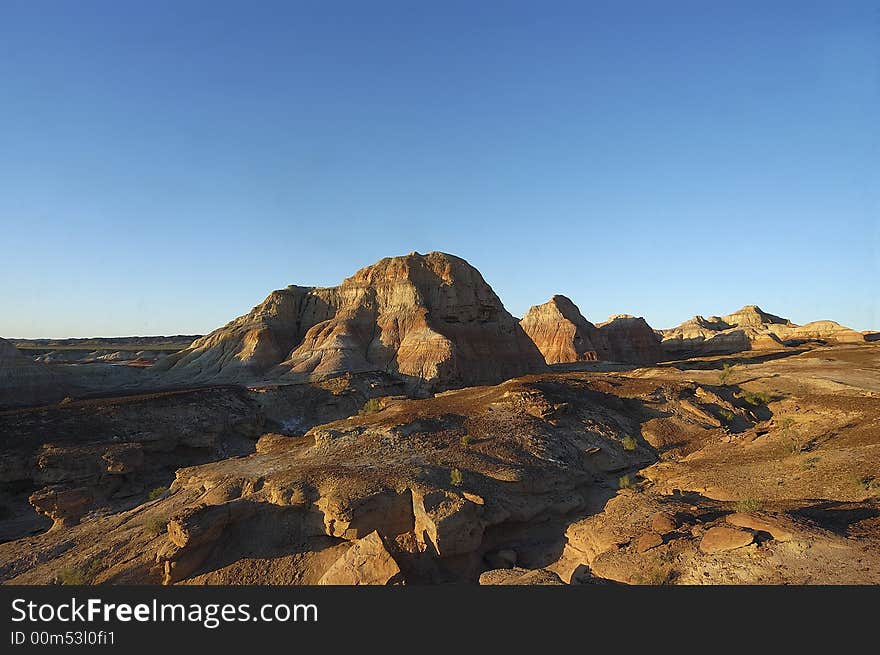 Rocky hill blue sky red color