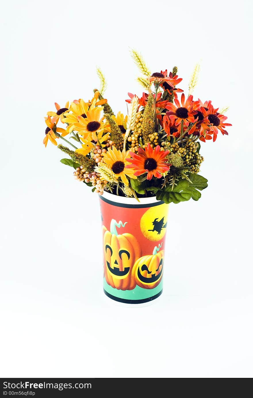 Flowers in a Halloween cup. Flowers in a Halloween cup