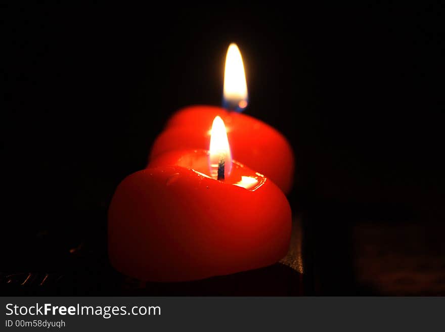 Two candles in form heart