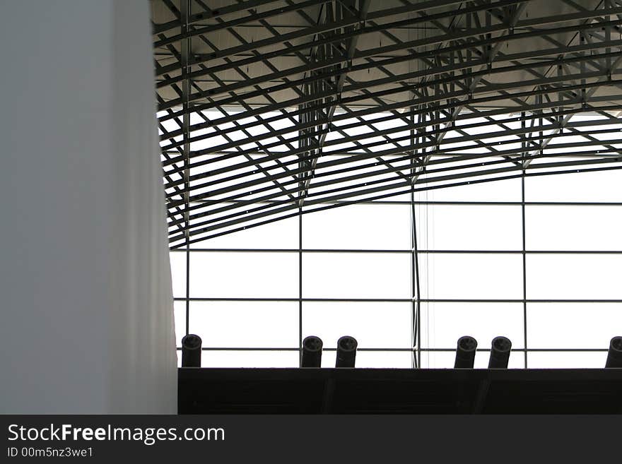 Big Window barrier in Frankfurt Airport Terminal 2. the steel construction shoring the slab.In front are the air condition. Big Window barrier in Frankfurt Airport Terminal 2. the steel construction shoring the slab.In front are the air condition