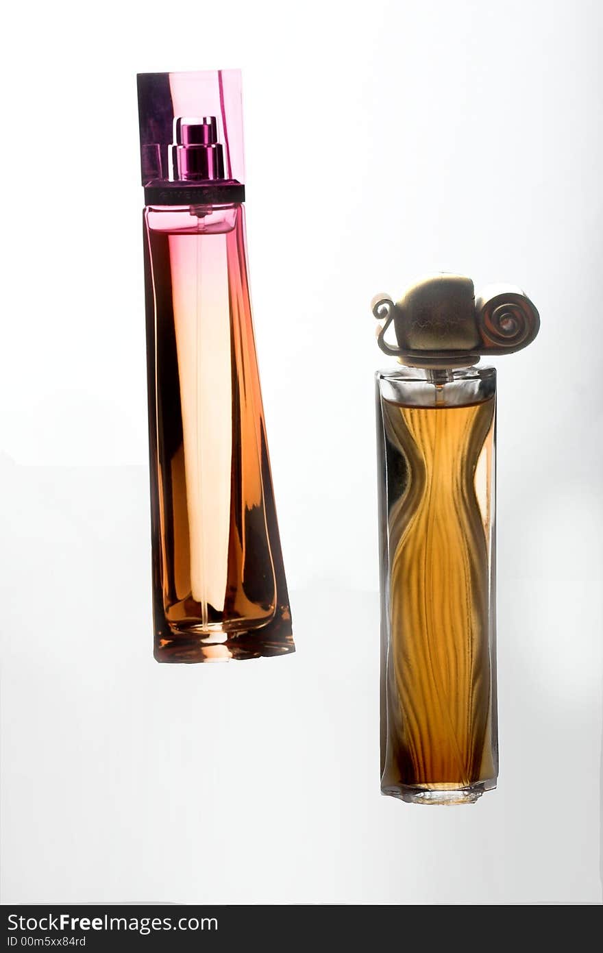 Spirits in an elegant small bottle from color glass. Spirits in an elegant small bottle from color glass