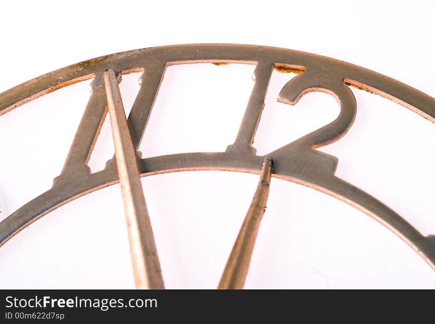 Time of retro clock eleven fifty five over white background