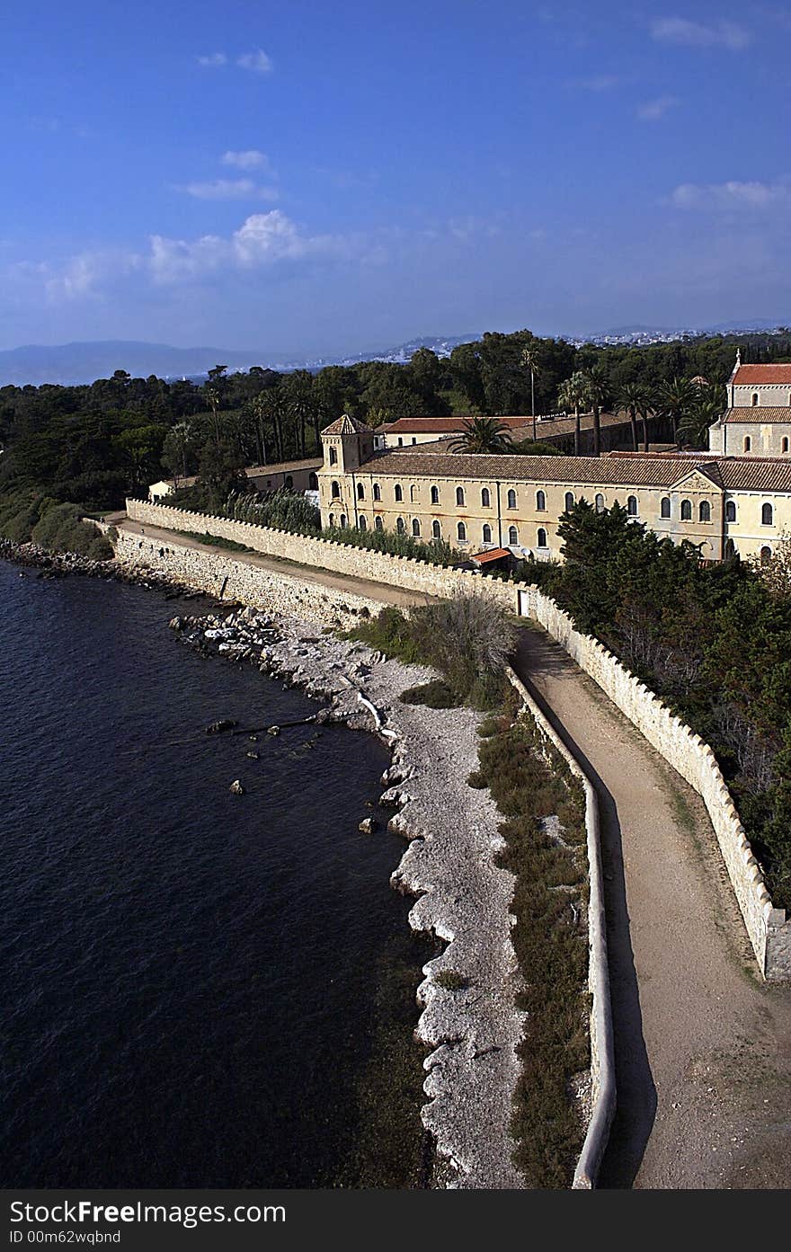 Panoramic picture of island's coastline and the castle on it. Panoramic picture of island's coastline and the castle on it