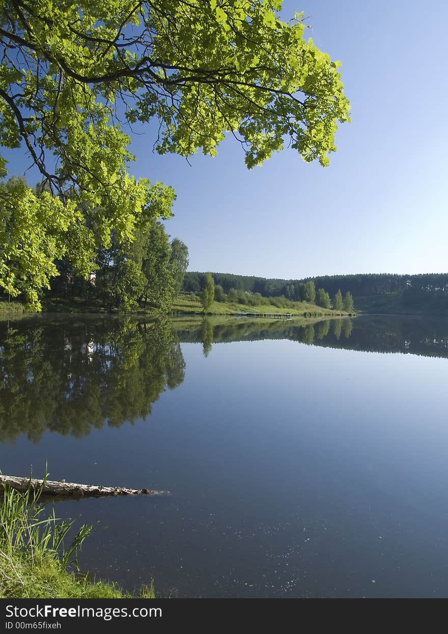 Early morning on coast of small lake. Early morning on coast of small lake