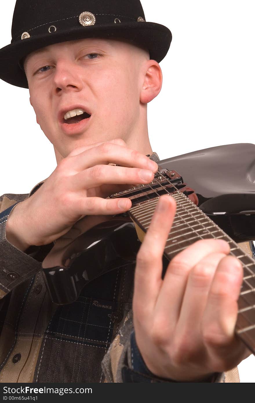 The musician with a guitar on a white background