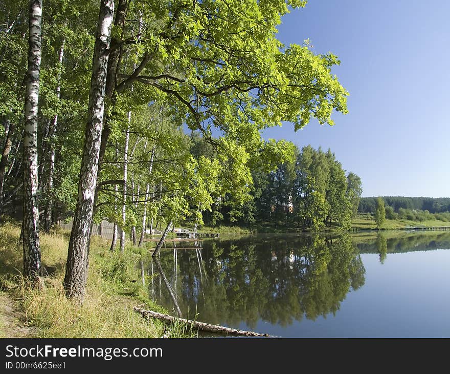 Early morning on coast of small lake. Early morning on coast of small lake