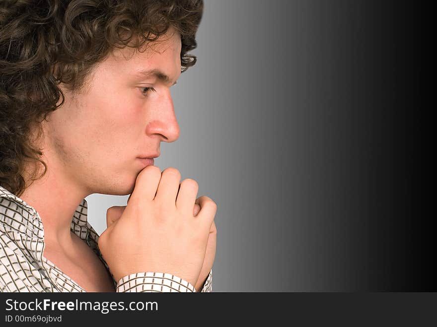 Portrait serious men on a Grey background. Portrait serious men on a Grey background