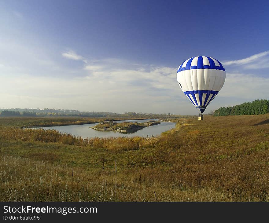 Hot Air Balloon Over Pond