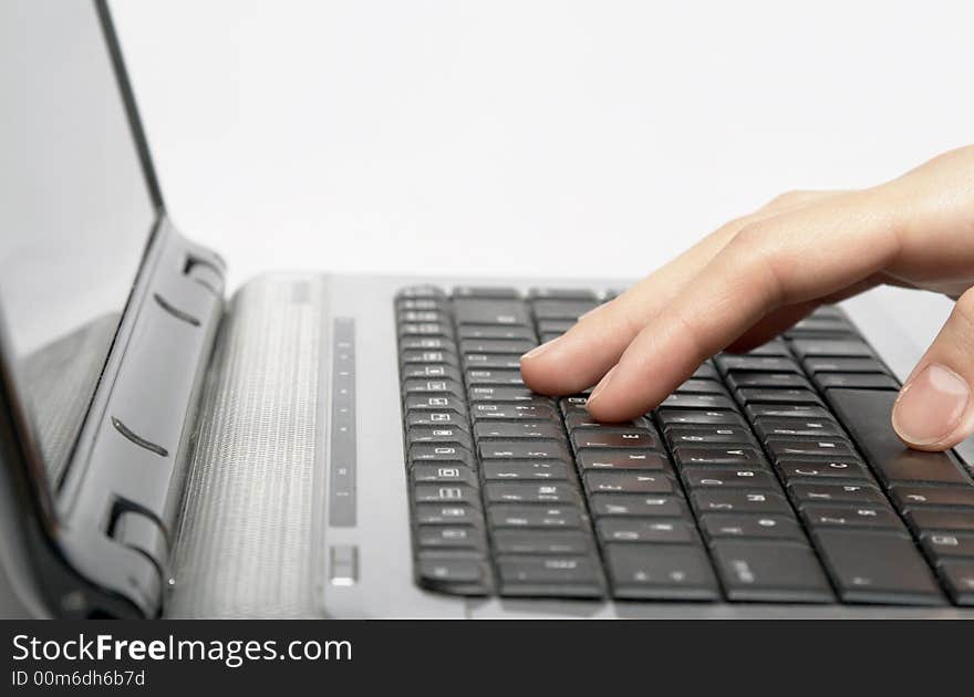 Female hands typing a text