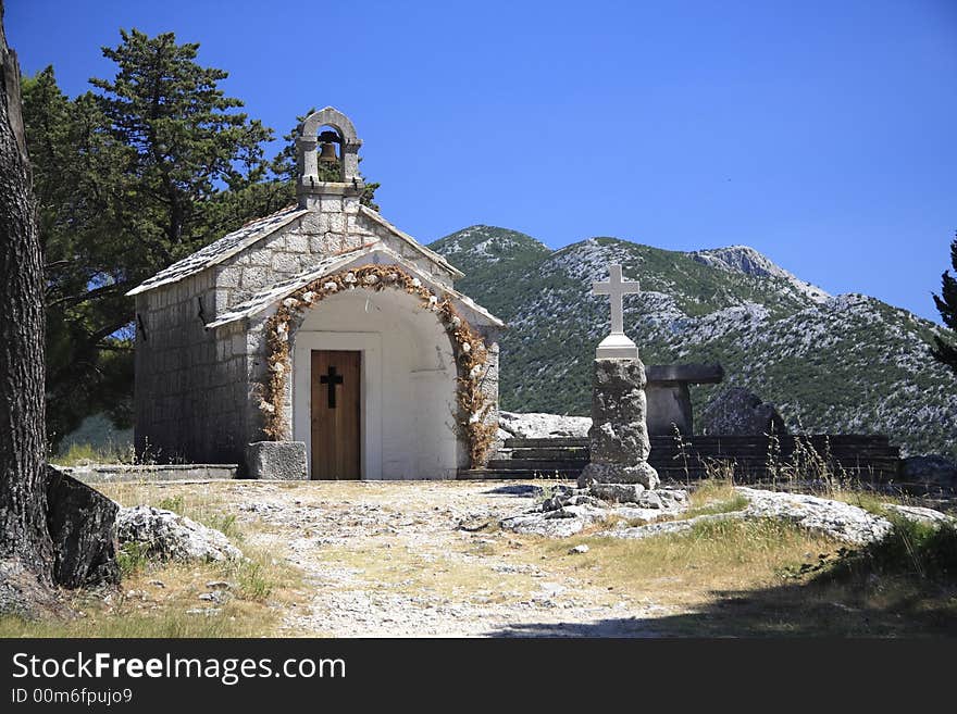 Croatian chapel with cross and table