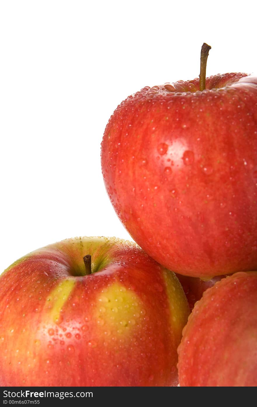 Red apples with dewdrops isolated. Red apples with dewdrops isolated