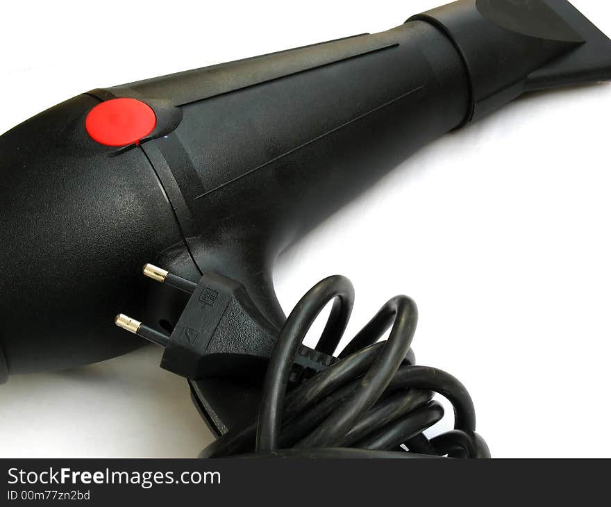 A black professional hairdryer isolated on white background