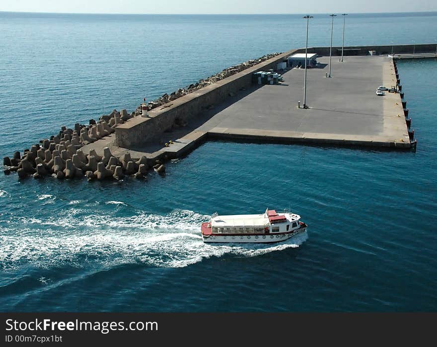 Boat Sailing To Port