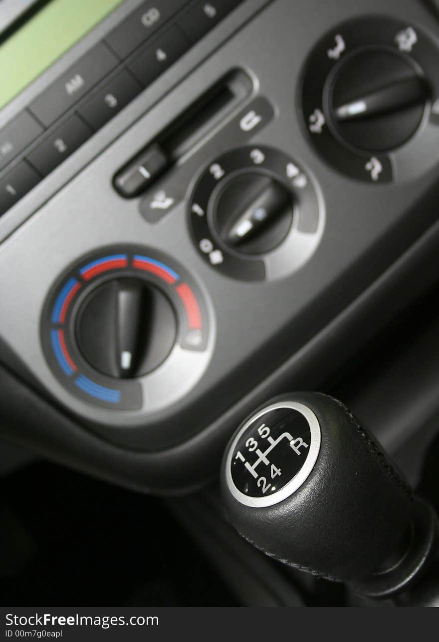 Gear handle and part of interior of modern family car (shallow dept)