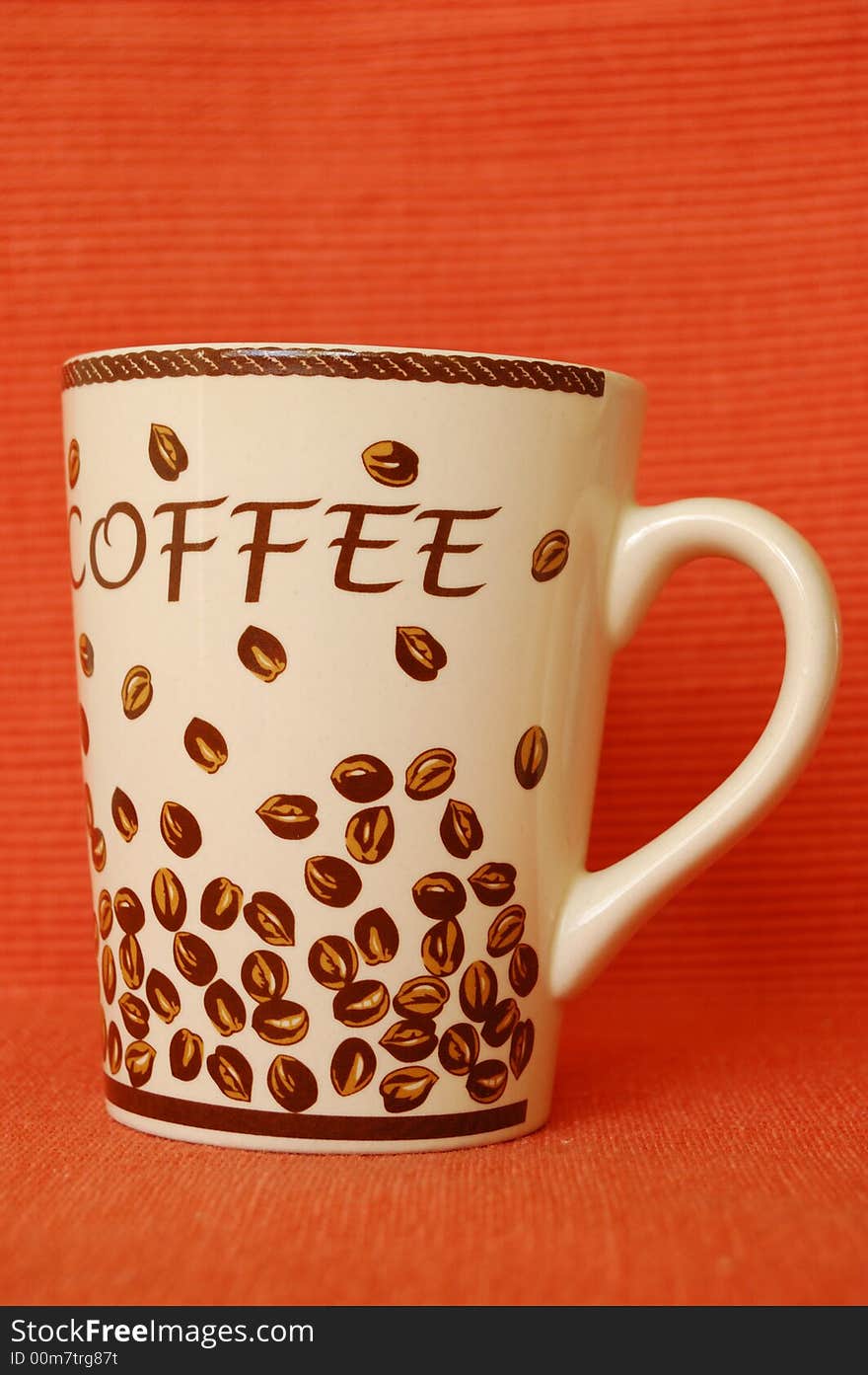 Beautiful coffee mug on red