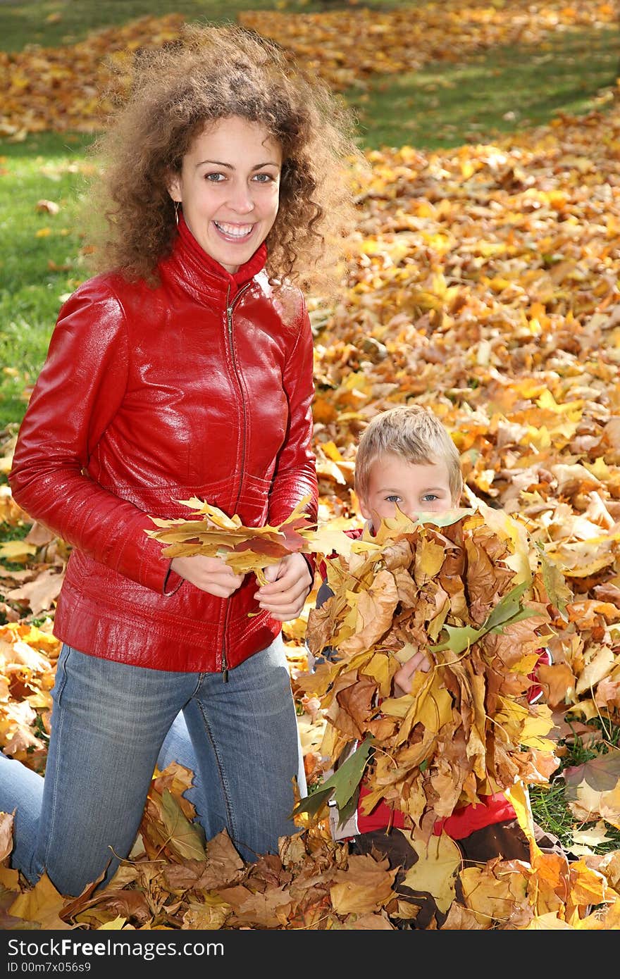 Mom and son in autumn park