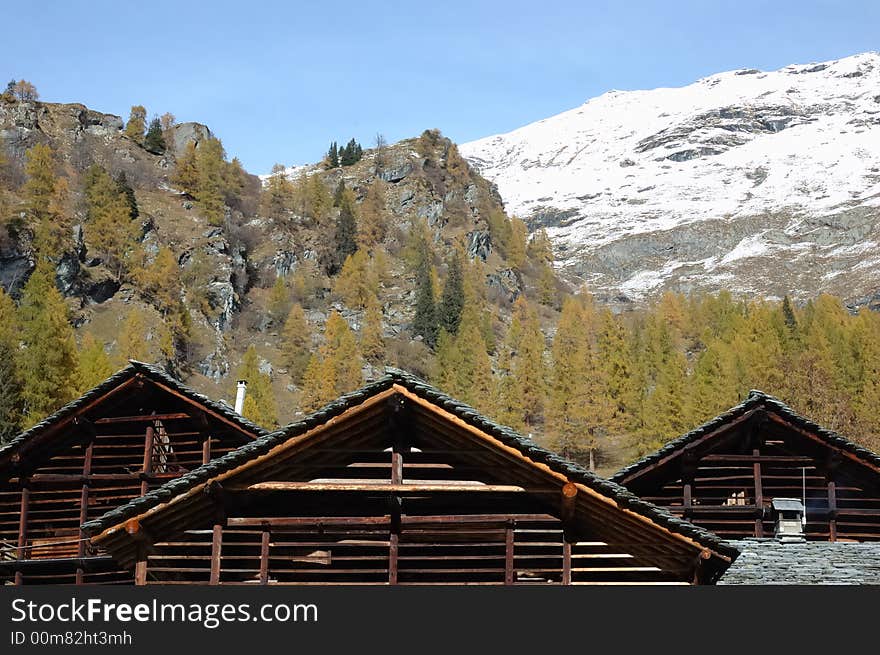 Mountain village during fall season; west Alps, Italy