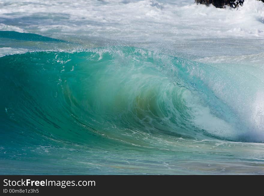 Giant wave breaking in shallow waters