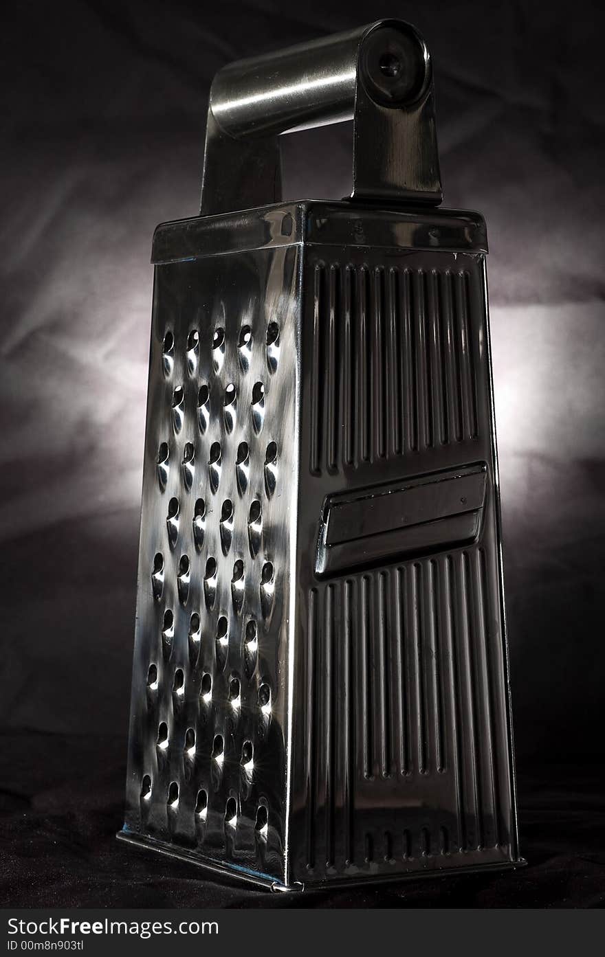 Stylish parmesan grater, isolated on black