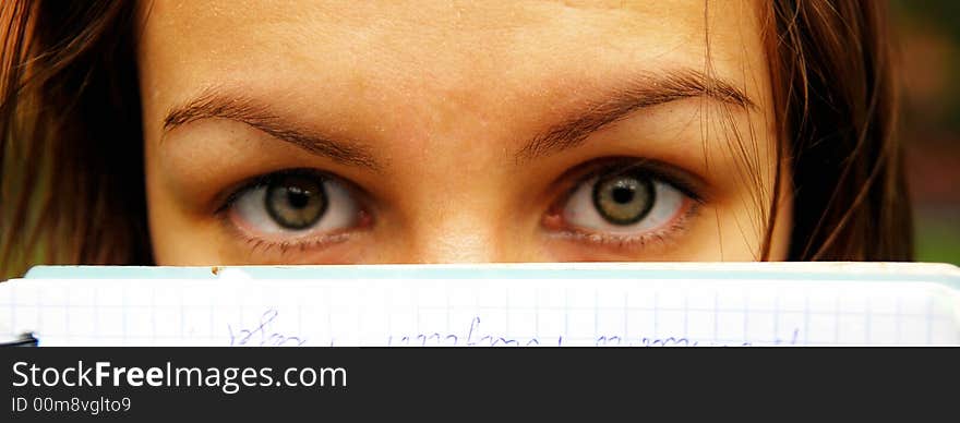 Young student with her copybook. Young student with her copybook