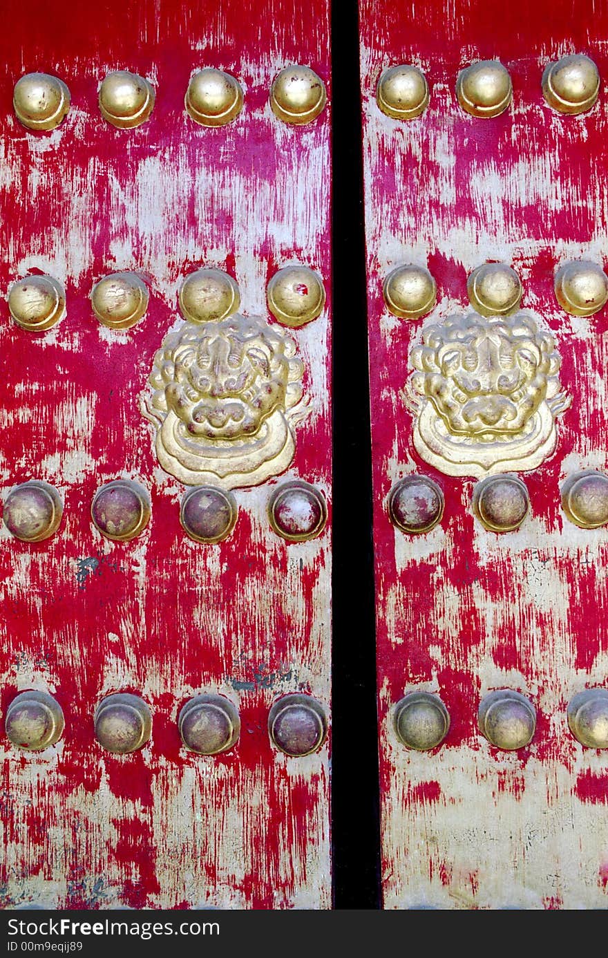 Red door of a traditional chinese architecture.Beijing,China.