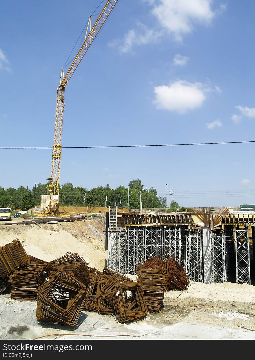 Construction site including steel structure and crane. Construction site including steel structure and crane