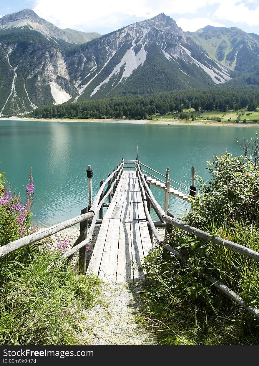 Wooden jetty in mountains