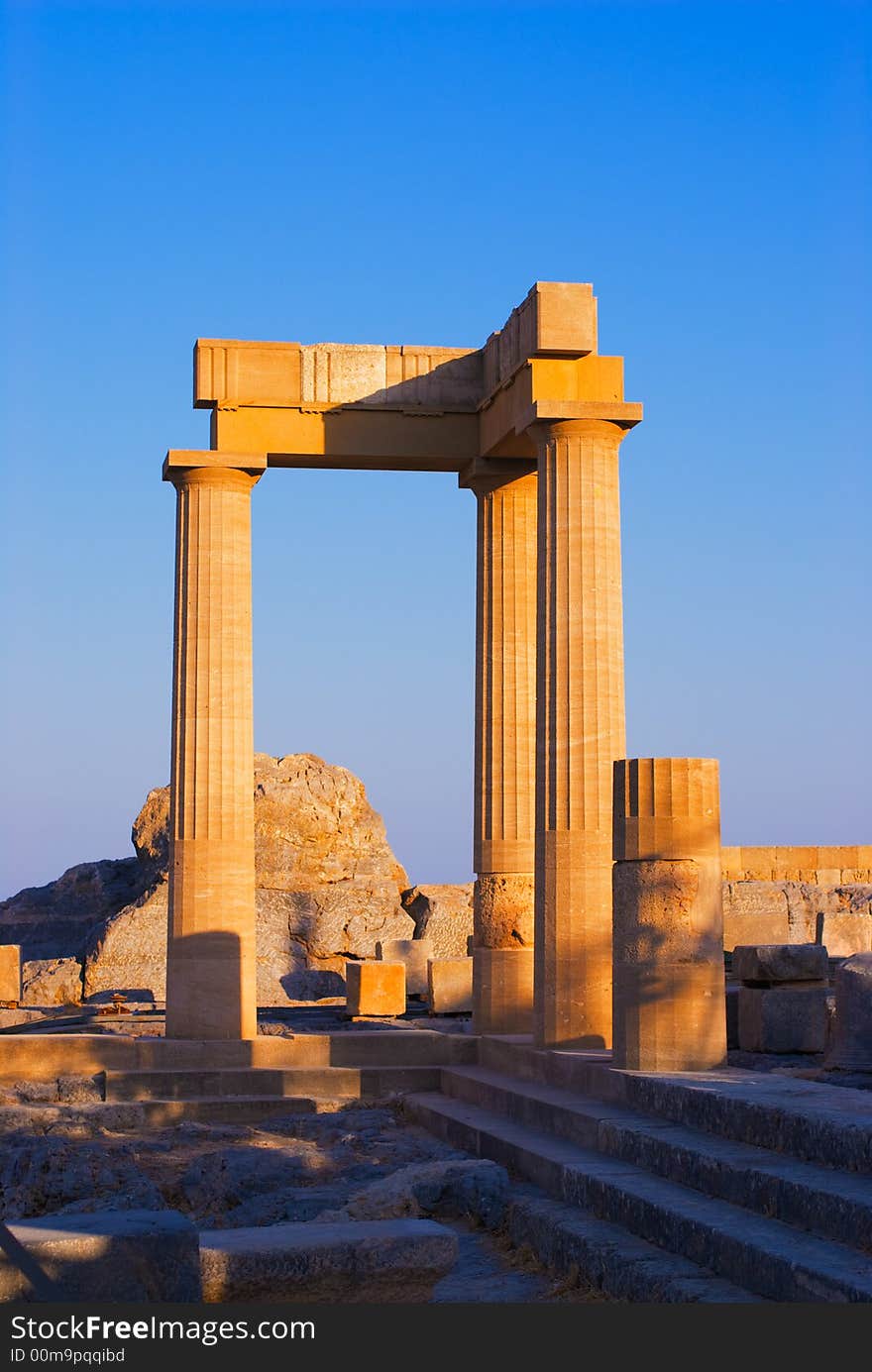 Temple of Athena at the top of Acropolis in ancient town Lindos, Rhodes island, Greece. Temple of Athena at the top of Acropolis in ancient town Lindos, Rhodes island, Greece