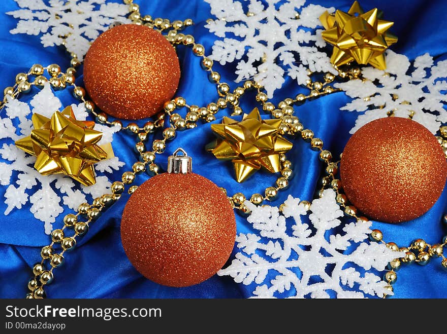 Christmas balls decorations on blue stuff. Christmas balls decorations on blue stuff