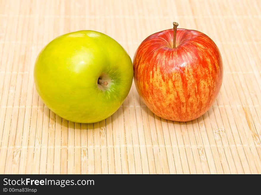 A green and a red apple. A green and a red apple