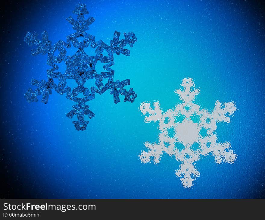 Two flakes on frosted glass - rendered in 3d. Two flakes on frosted glass - rendered in 3d