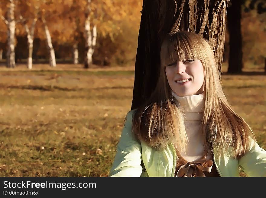 Portrait of a young girl looking up at the camera. Portrait of a young girl looking up at the camera