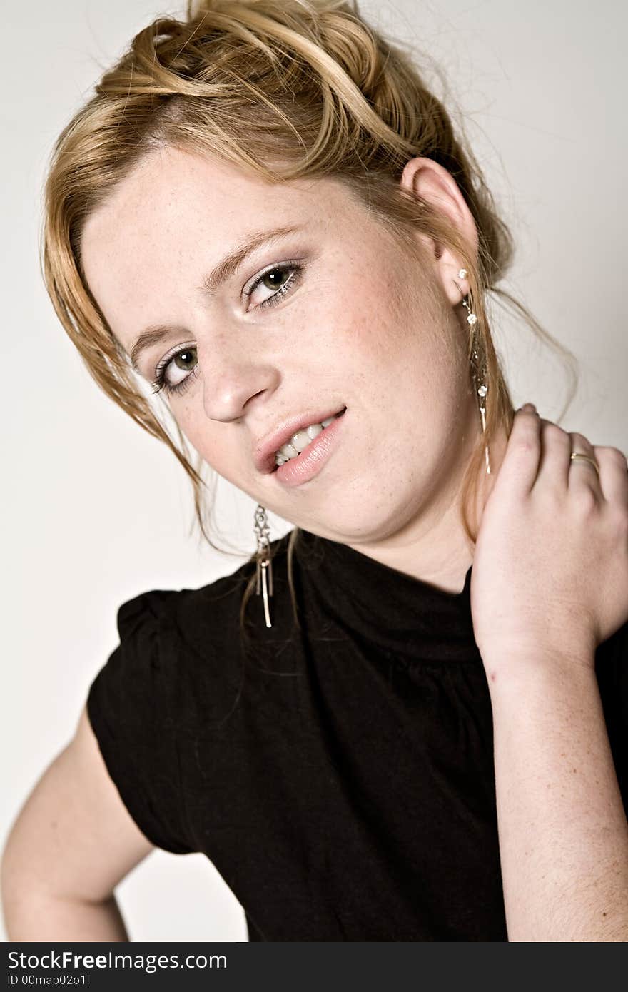 Couple of teenagers in the studio on a white background. Couple of teenagers in the studio on a white background