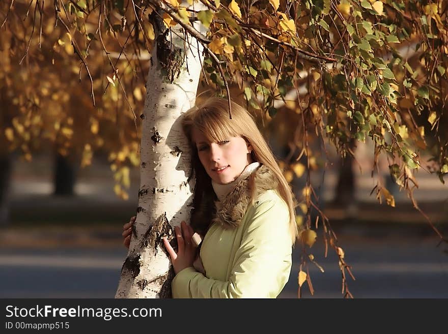 Portrait of a young girl looking up at the camera. Portrait of a young girl looking up at the camera