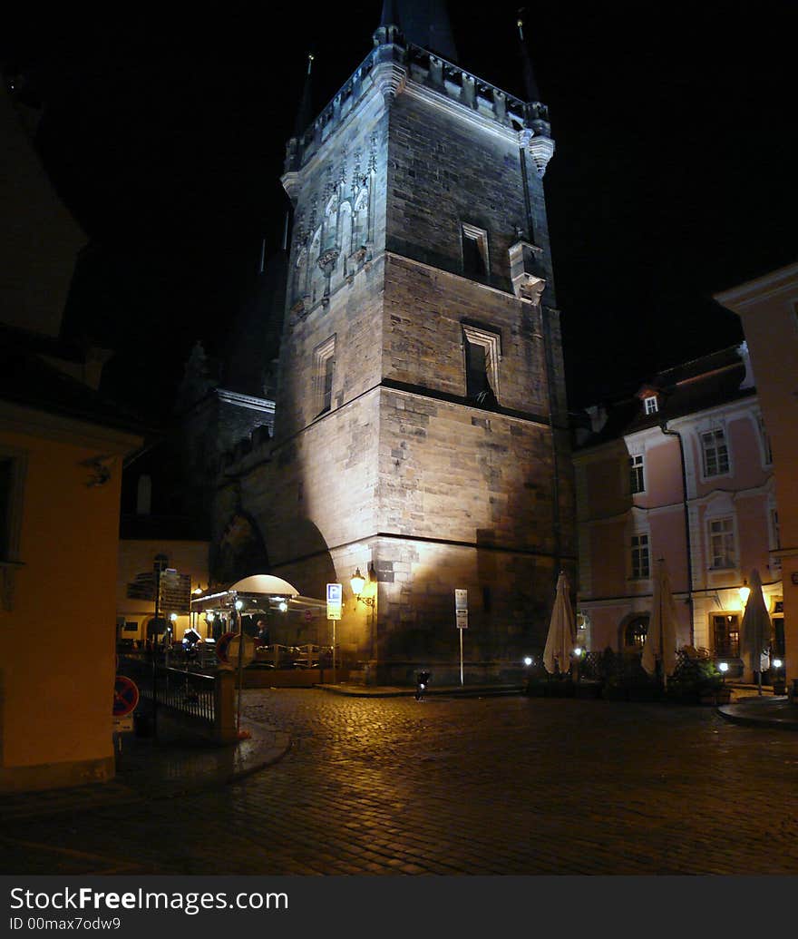 Prague tower at night alight