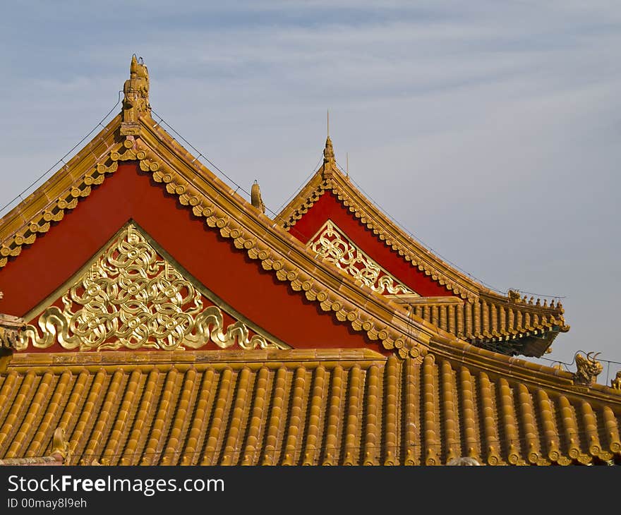 Edge of a chinese temple roof with little figures on it. Edge of a chinese temple roof with little figures on it