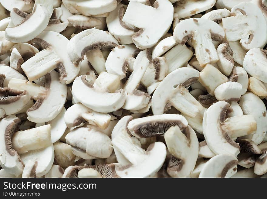 Closeup of many champignons, prepared for cooking. Closeup of many champignons, prepared for cooking